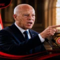 Image of President Kais Saied in a firm stance, with symbolic elements of justice and law in Tunisia, reflecting strict decisions and their strong enforcement